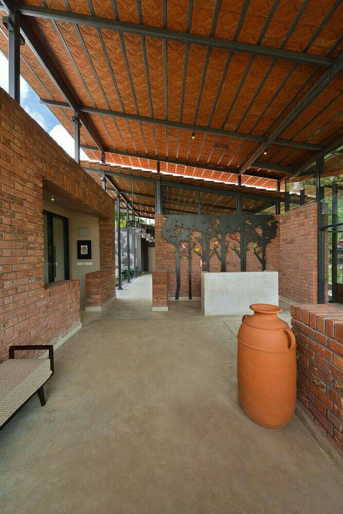 Clay tile and T-iron ceiling roofing system in Karachi